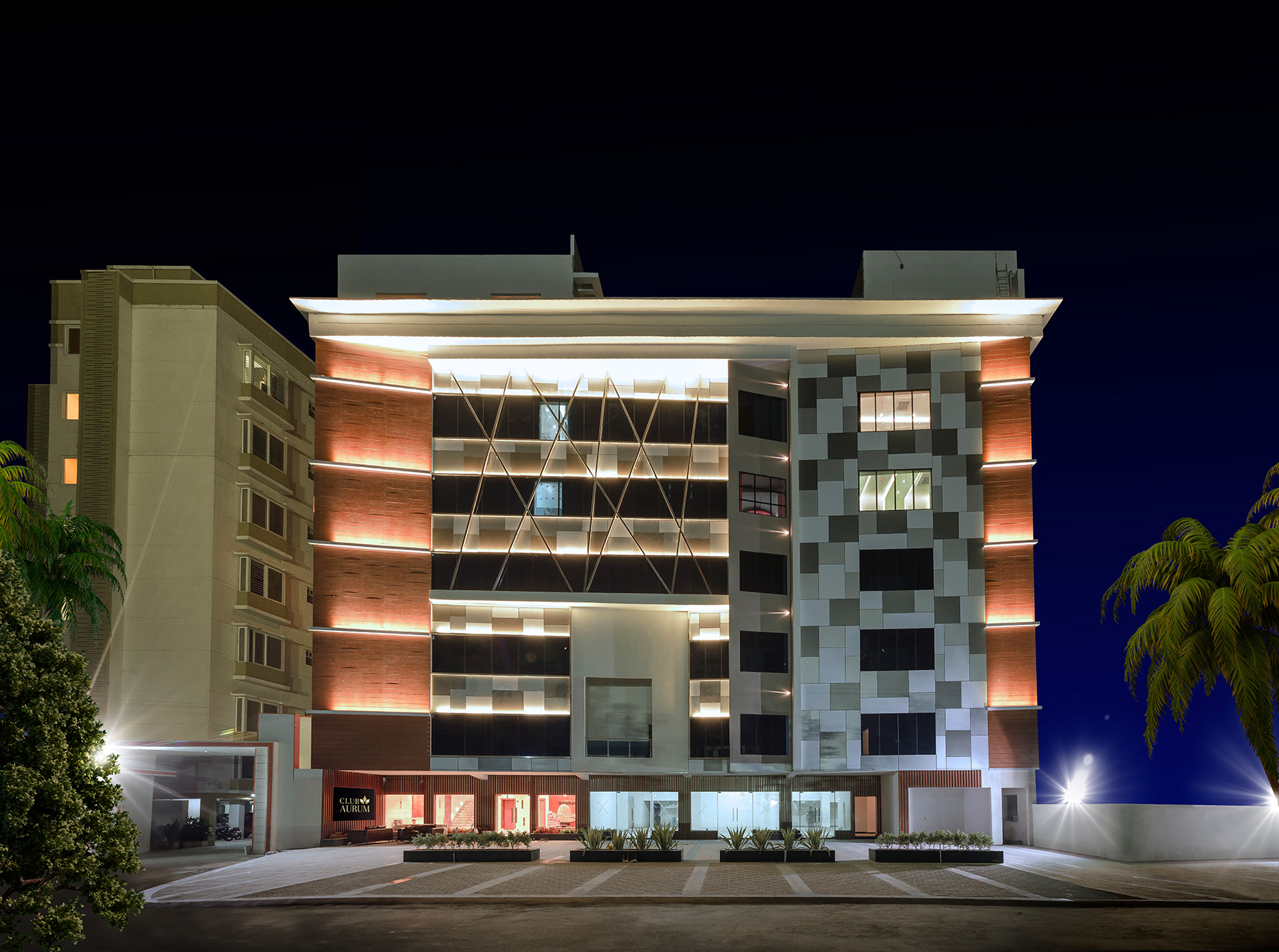 Club Aurum clubhouse at night